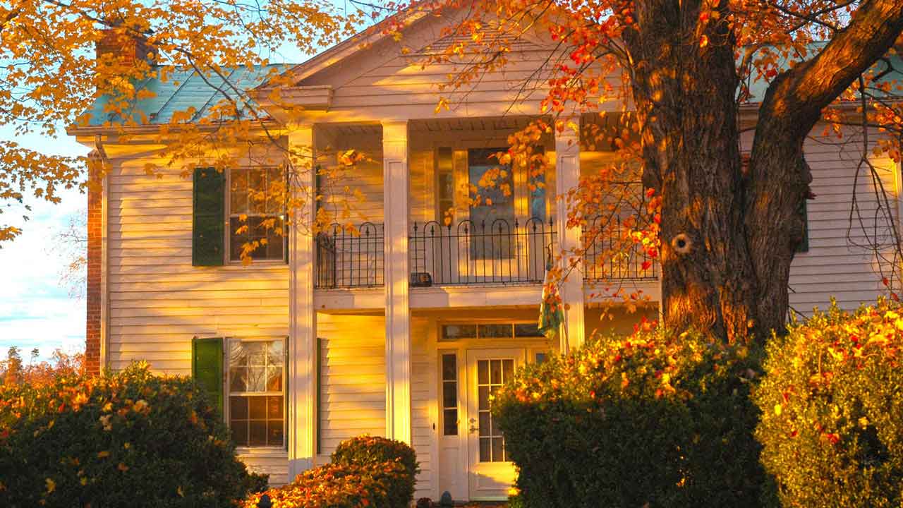A charming historic home bathed in morning light.